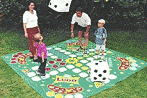 Family Playing Ludo Game in Garden