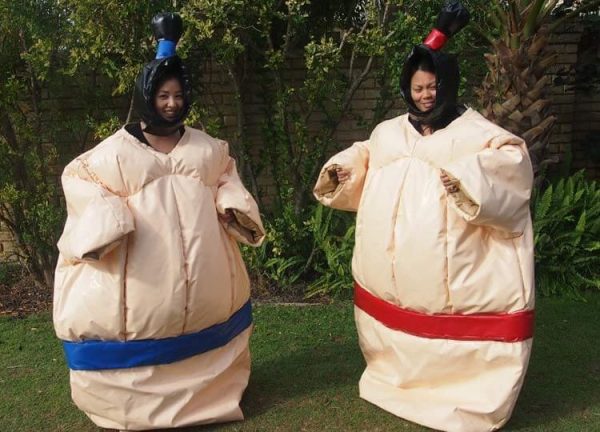 2 People Wearing Inflatable Sumo Suits