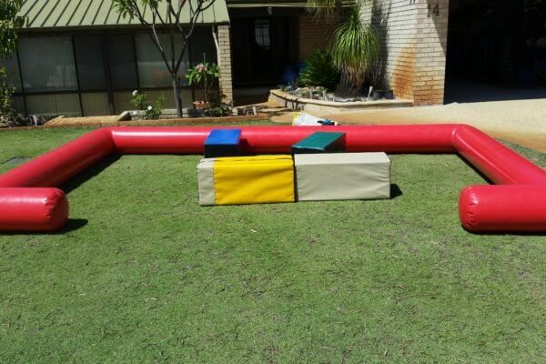 Inflatable Red Toddler Play Pen on Grass